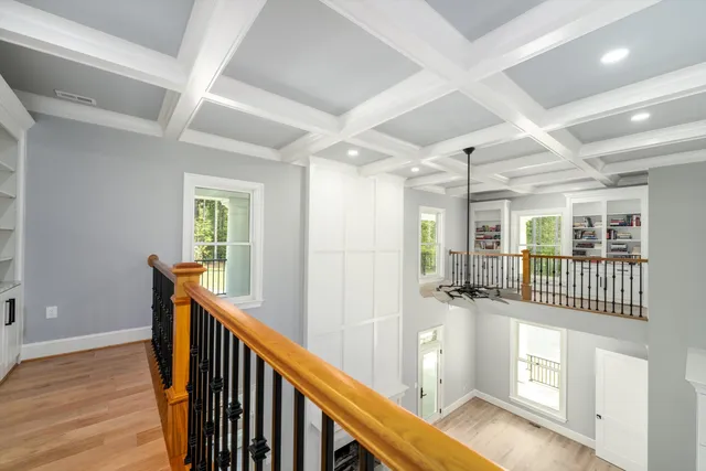 a bathroom with a double vanity sink toilet and shower