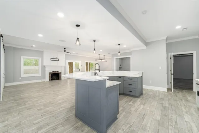 a view of a house with a yard and balcony