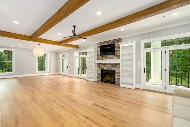 a kitchen with stainless steel appliances kitchen island granite countertop a stove and a sink