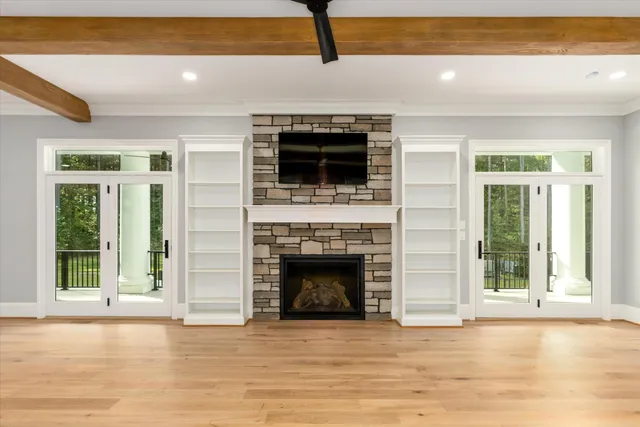 a kitchen with sink stove and refrigerator