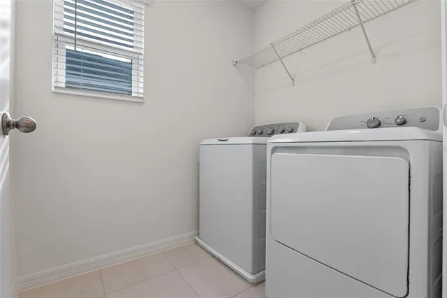 a bathroom with a sink toilet and mirror