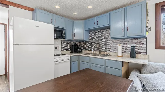 $335,000 | 30031 Oak Knoll Road, Rocky Mount, MO 65072