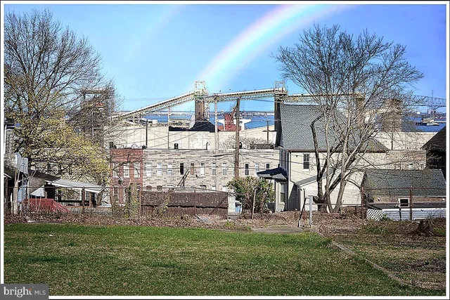 a view of a big yard next to a house