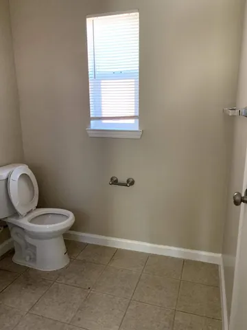 a bathroom with a toilet