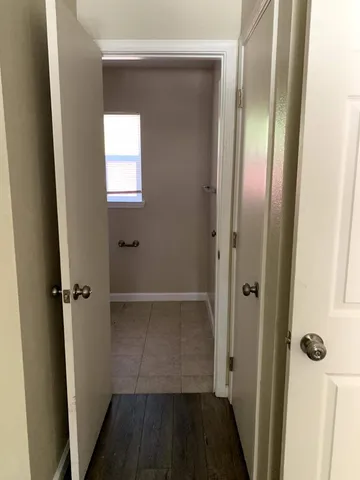 a bathroom with a glass door shower