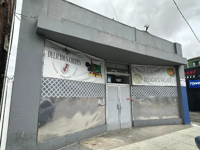 a bathroom with a glass door shower