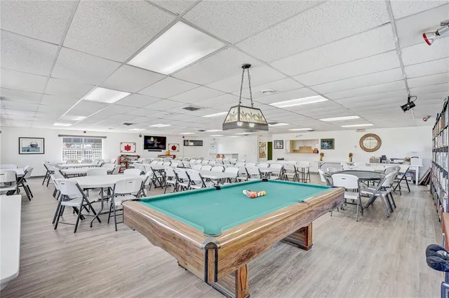 a view of a room with furniture and rug