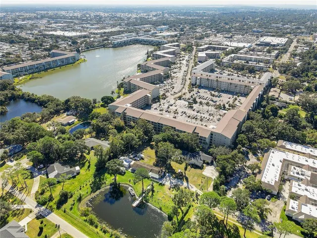 an aerial view of lake residential house with outdoor space