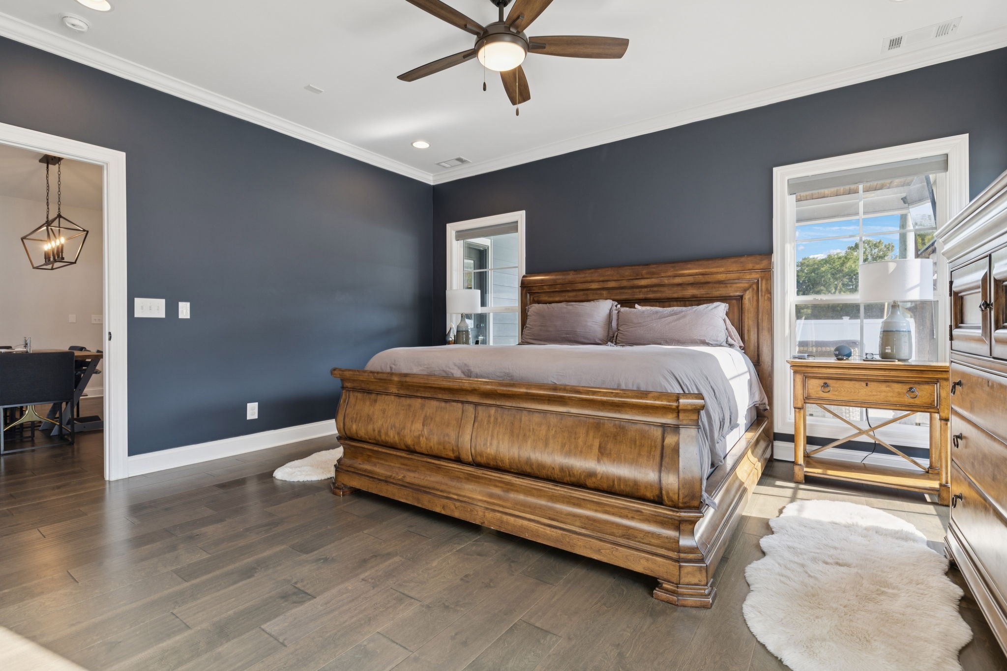 2022 Trout Trail Murfreesboro, TN 37129 - Photo 20 of 44 a bedroom with a bed and a chandelier