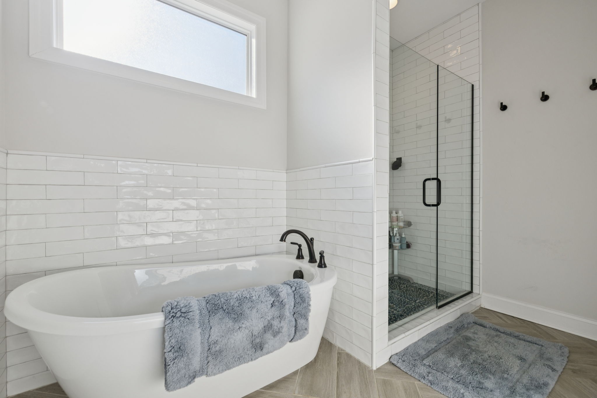 2022 Trout Trail Murfreesboro, TN 37129 - Photo 23 of 44 a bathroom with a bathtub and shower