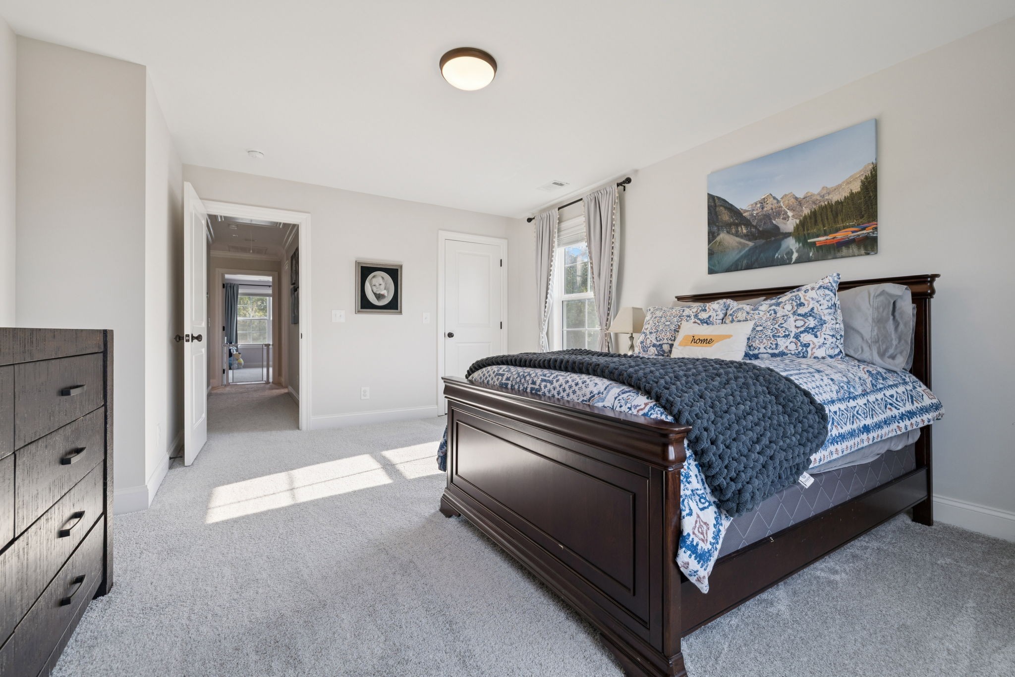 2022 Trout Trail Murfreesboro, TN 37129 - Photo 29 of 44 a bed room with a bed and a painting on the wall