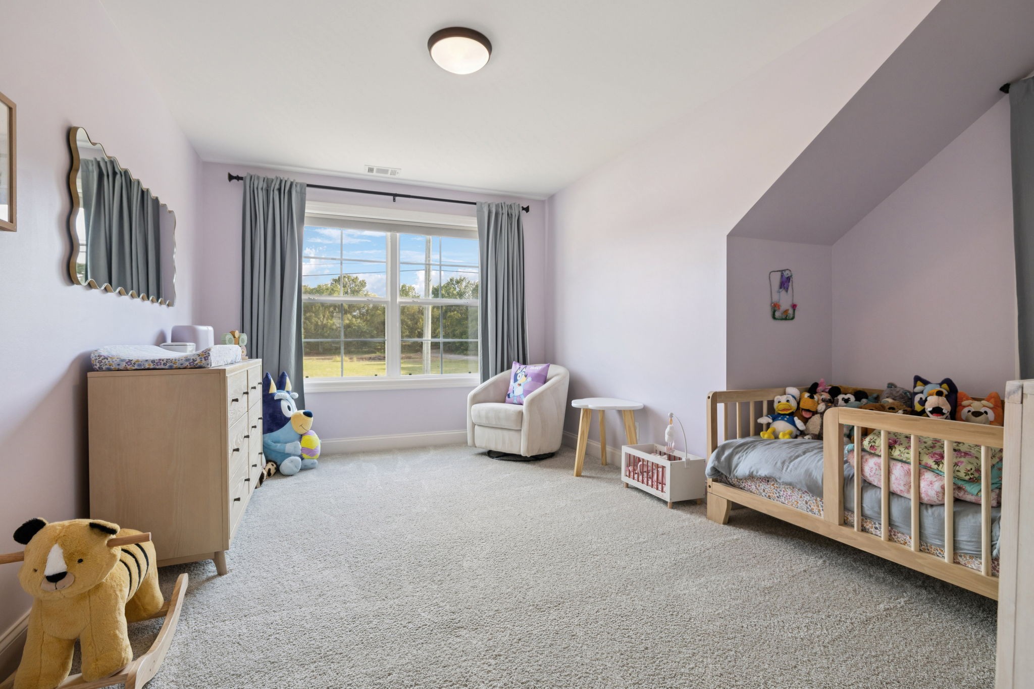 2022 Trout Trail Murfreesboro, TN 37129 - Photo 30 of 44 a bedroom with three beds and a window