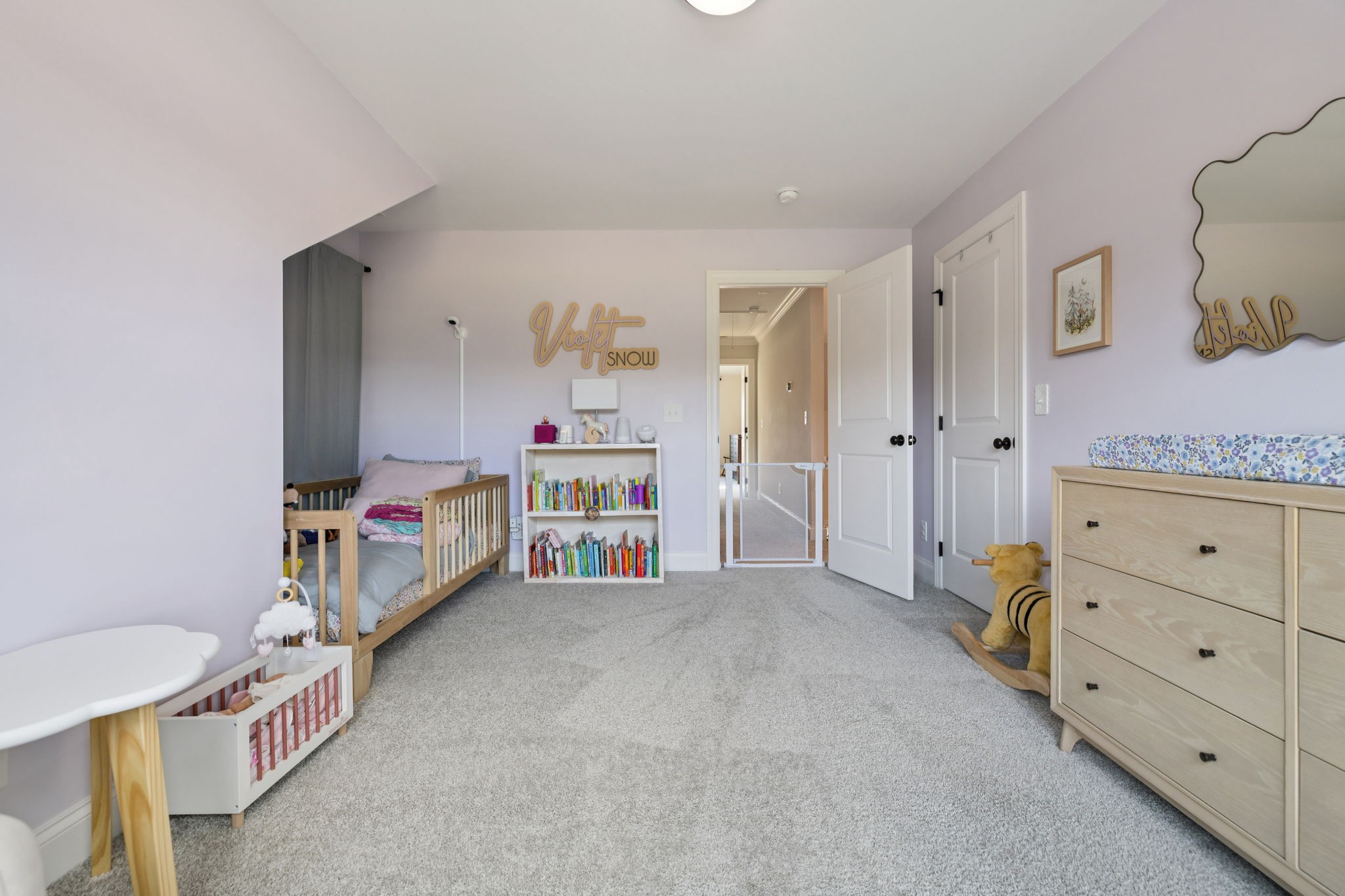 2022 Trout Trail Murfreesboro, TN 37129 - Photo 31 of 44 a view of a bedroom with baby crib and lounge chair