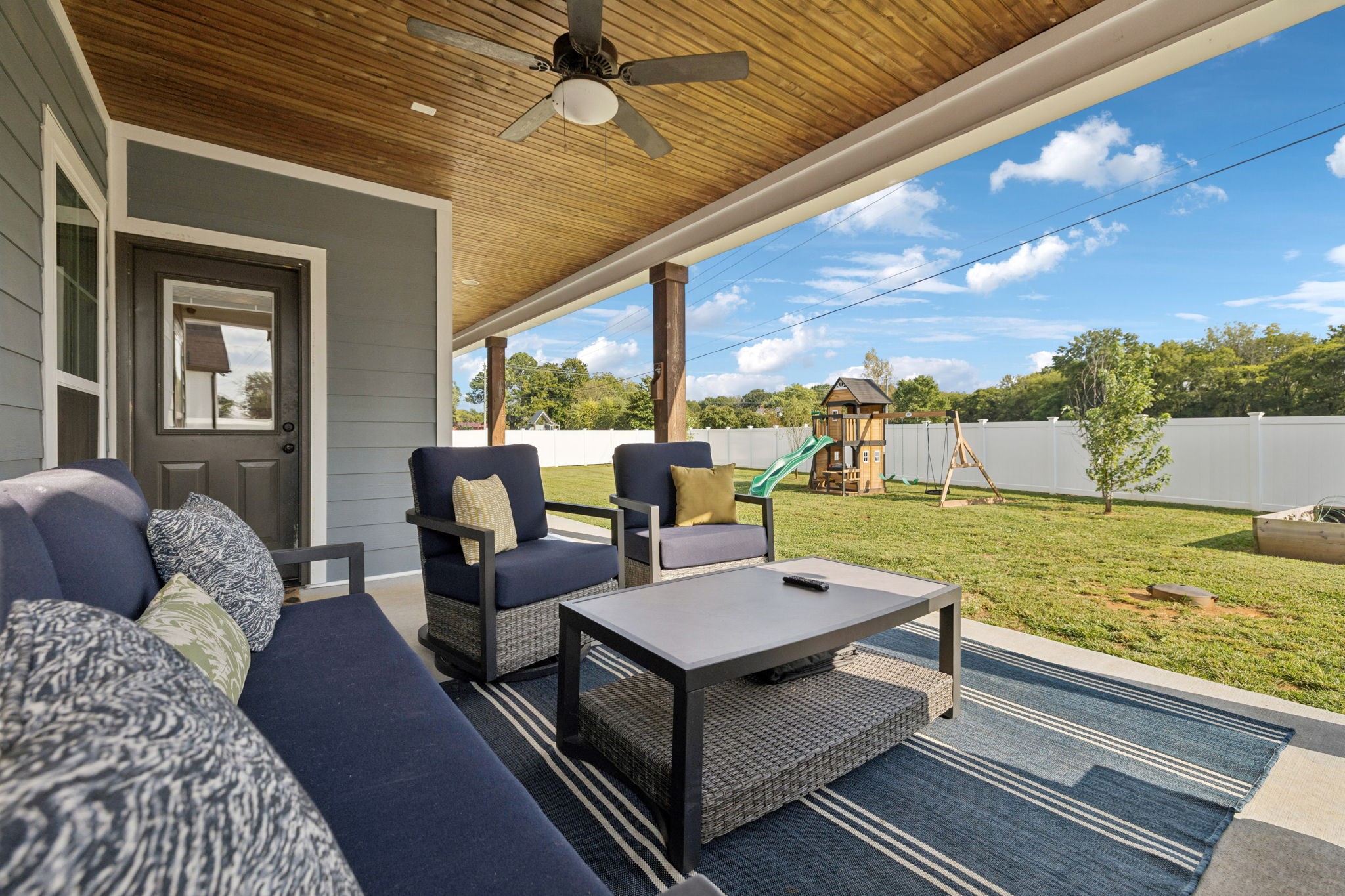 2022 Trout Trail Murfreesboro, TN 37129 - Photo 37 of 44 a living room with patio furniture and a ocean view