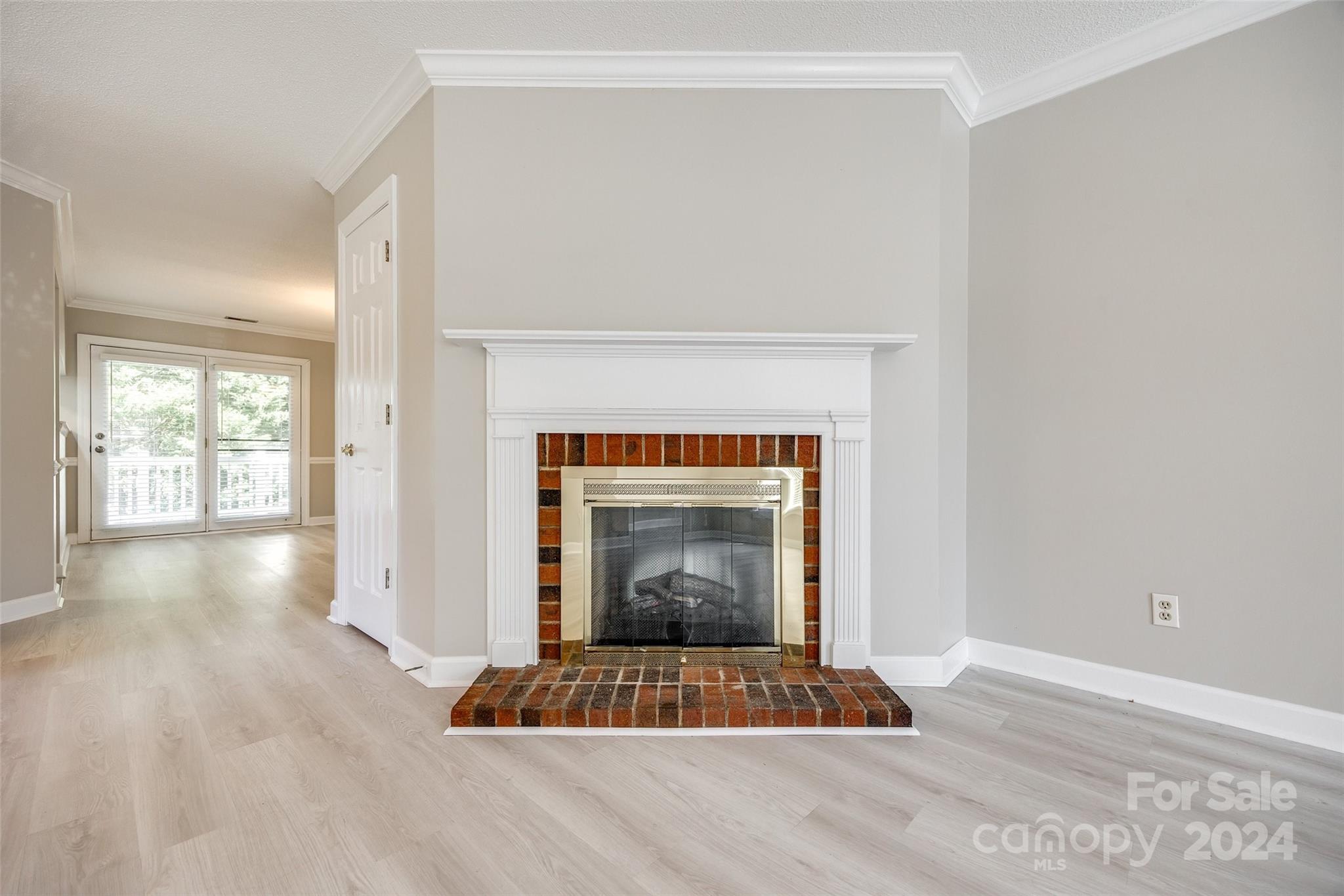 1711 Robinwood Road Gastonia, NC 28054 - Photo 8 of 25 a view of an empty room and fire place