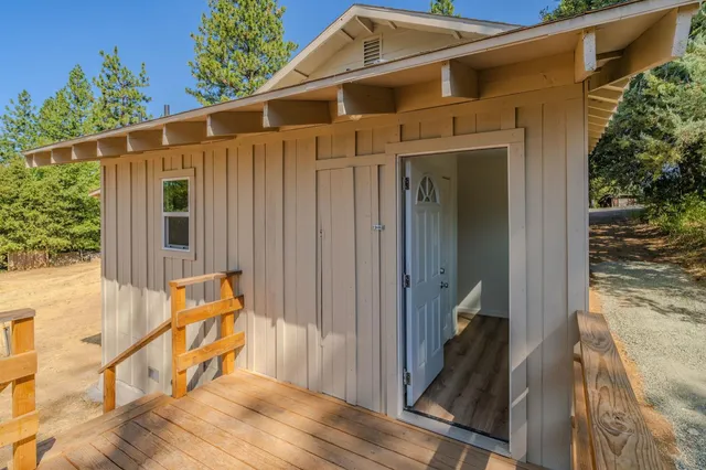 a front view of a house with a glass door