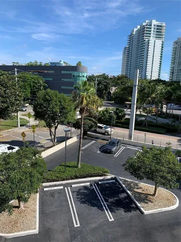 a view of a city with tall buildings