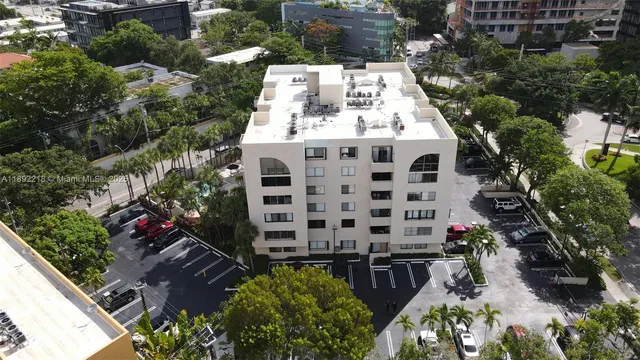 an aerial view of multi story residential apartment building
