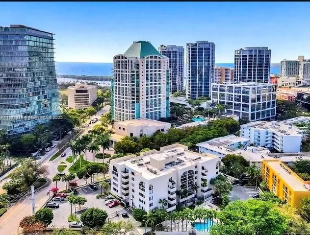 a view of a city with tall buildings