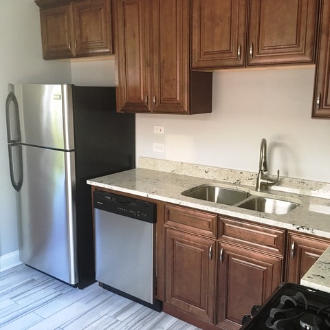 1530 State Line Road Calumet City, IL 60409 - Photo 6 of 16 a kitchen with a sink and a refrigerator