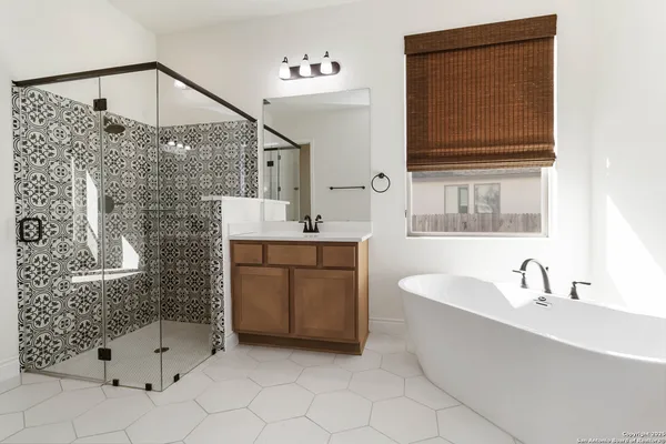 a bathroom with a sink and a bathtub