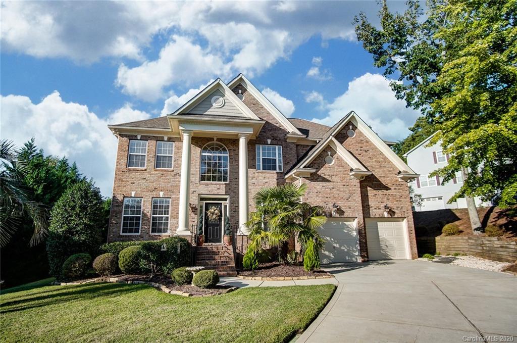 785 Fairway Point Drive Tega Cay, SC 29708 - Photo 1 of 46 a front view of a house with a yard