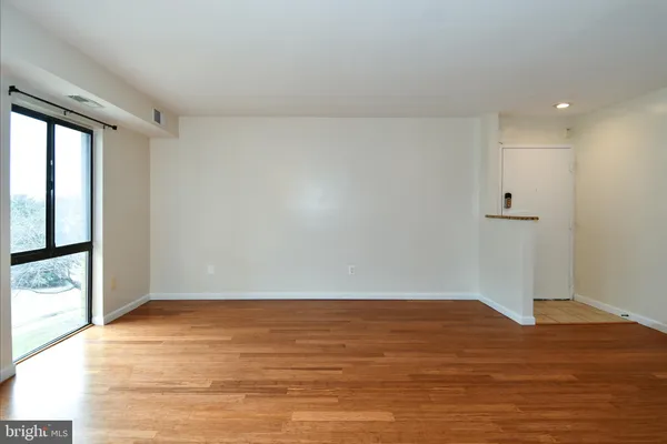 a view of a house with swimming pool and a yard
