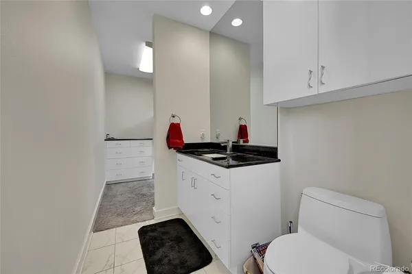 a kitchen with stainless steel appliances a refrigerator stove microwave and cabinets