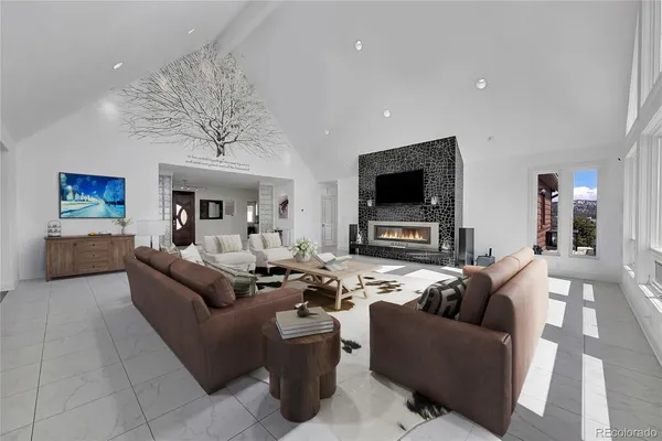 a kitchen with stainless steel appliances kitchen island granite countertop a sink and cabinets