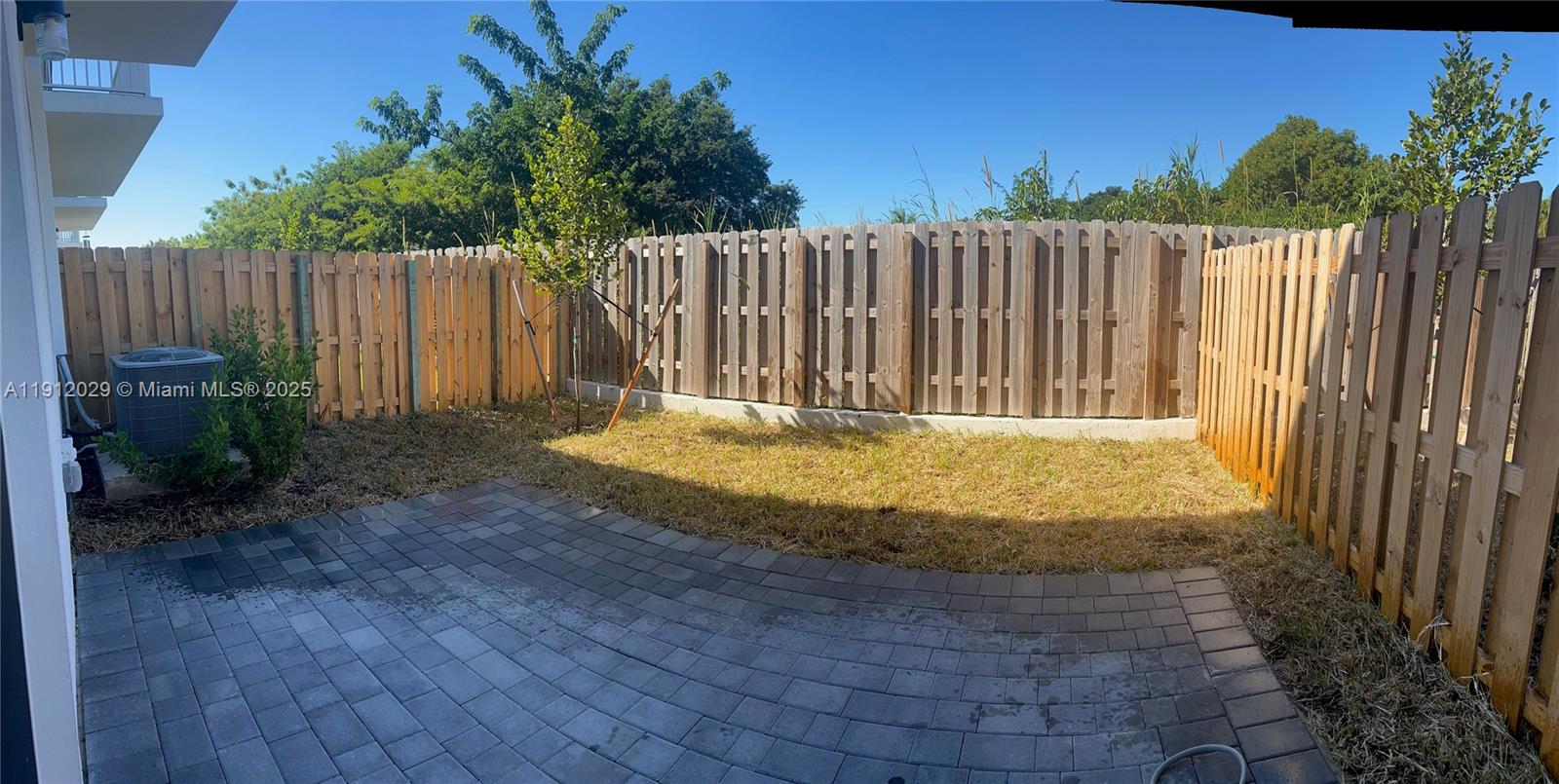 1406 Southeast 6th Road, Unit 1406 Homestead, FL 33034 - Photo 10 of 12 a view of outdoor space and yard