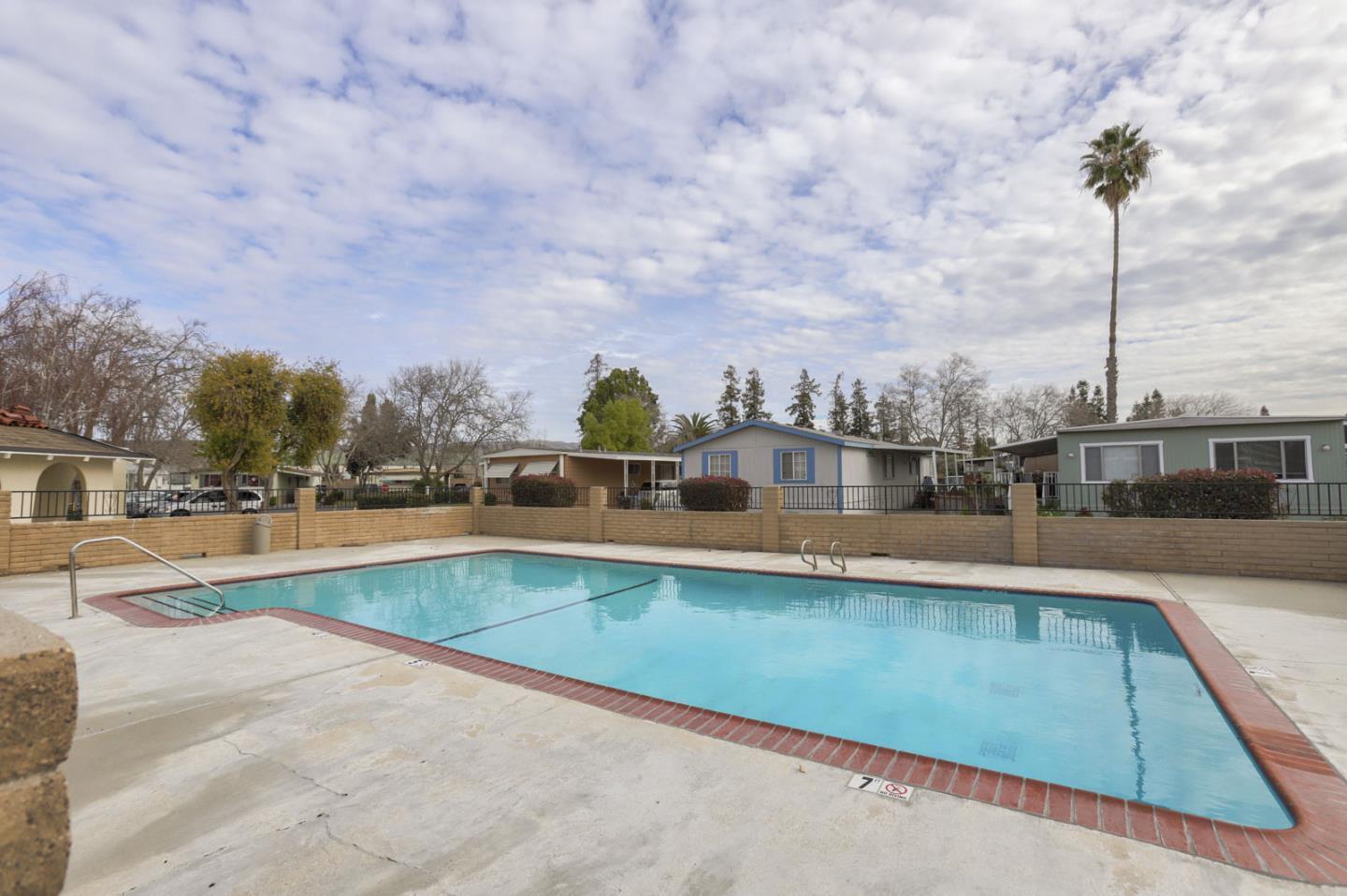 2151 Oakland Road, Unit 73 San Jose, CA 95131 - Photo 6 of 7 a view of swimming pool with outdoor seating and city view