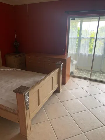 a view of a kitchen that has a sink and a stove