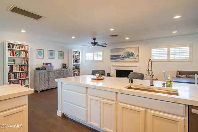 a kitchen with a stove microwave and sink