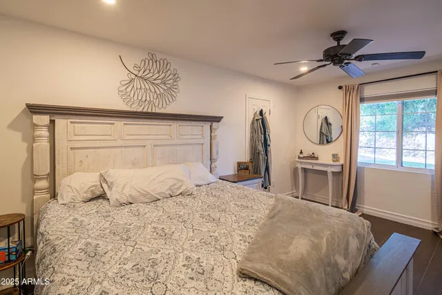 a bedroom with a bed and furniture