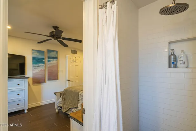 a view of a chairs and table in backyard