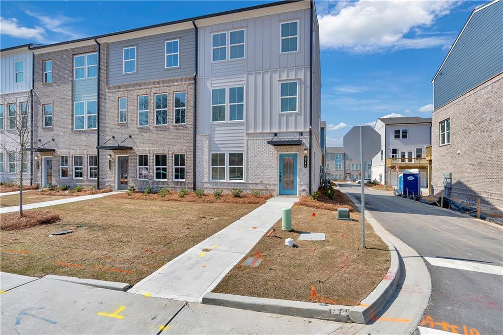 a view of a building with a swimming pool
