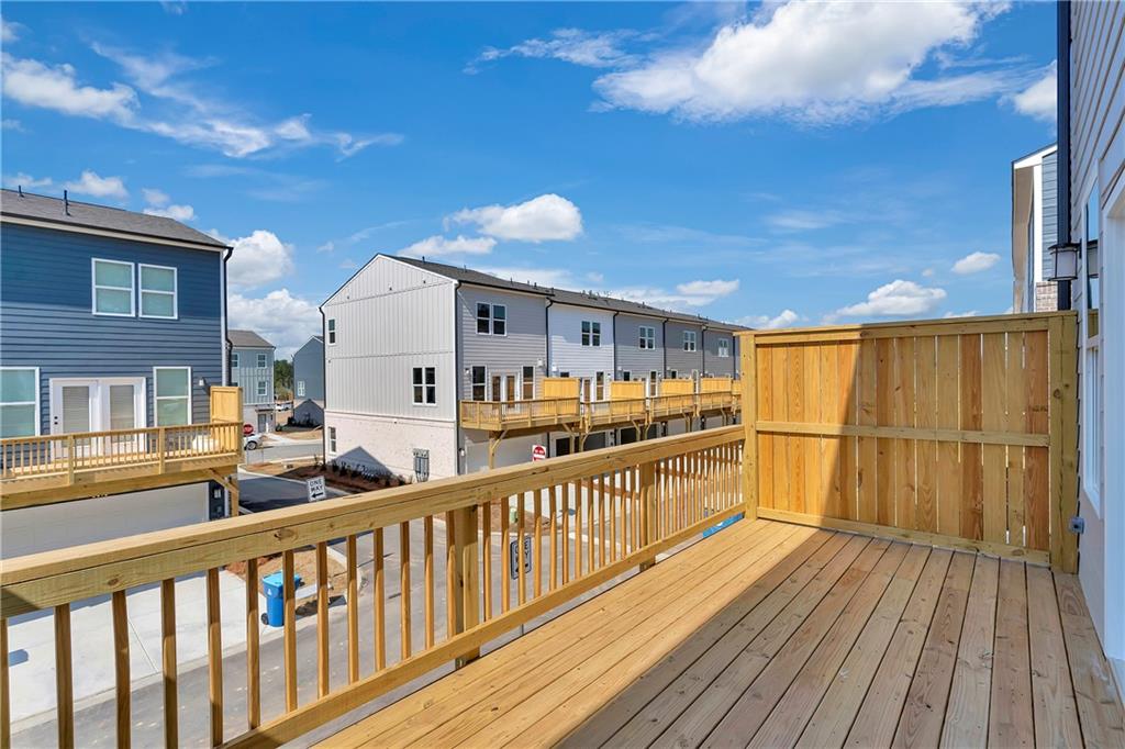 2244 Whistler Way Northeast Lawrenceville, GA 30043 - Photo 15 of 25 a view of a balcony with wooden floor