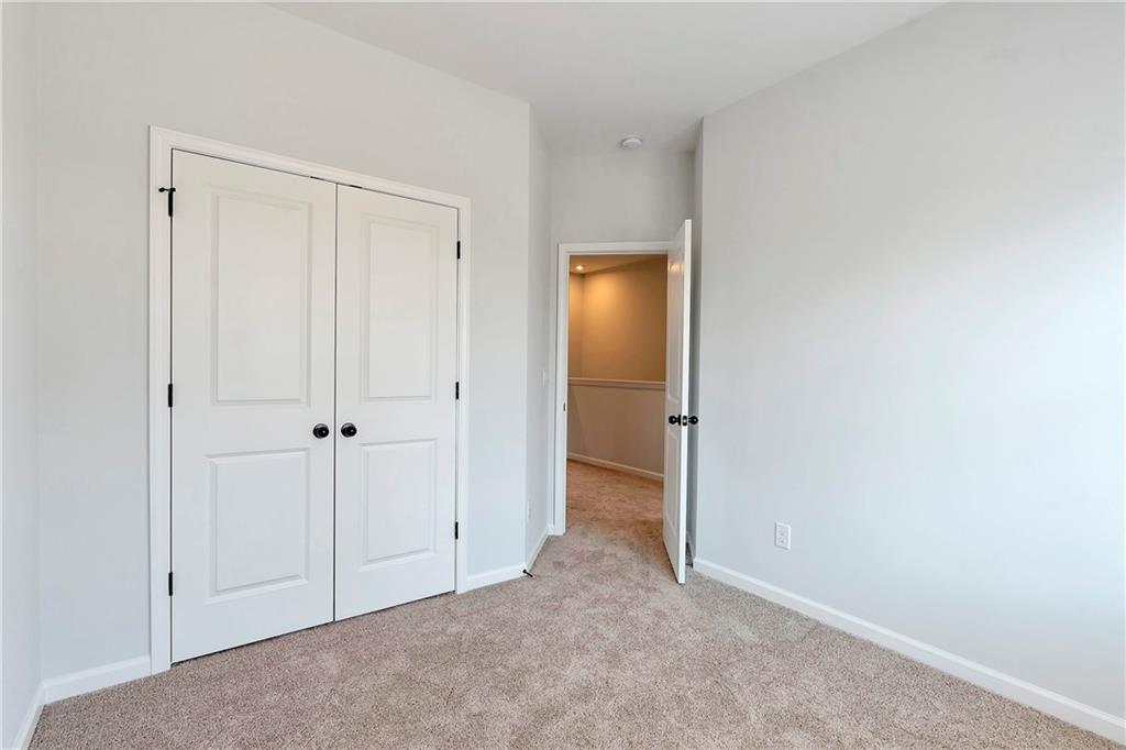 2244 Whistler Way Northeast Lawrenceville, GA 30043 - Photo 21 of 25 a view of an empty room with closet area