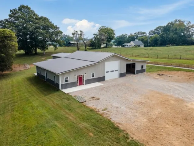 a view of a wooden deck and a lake view