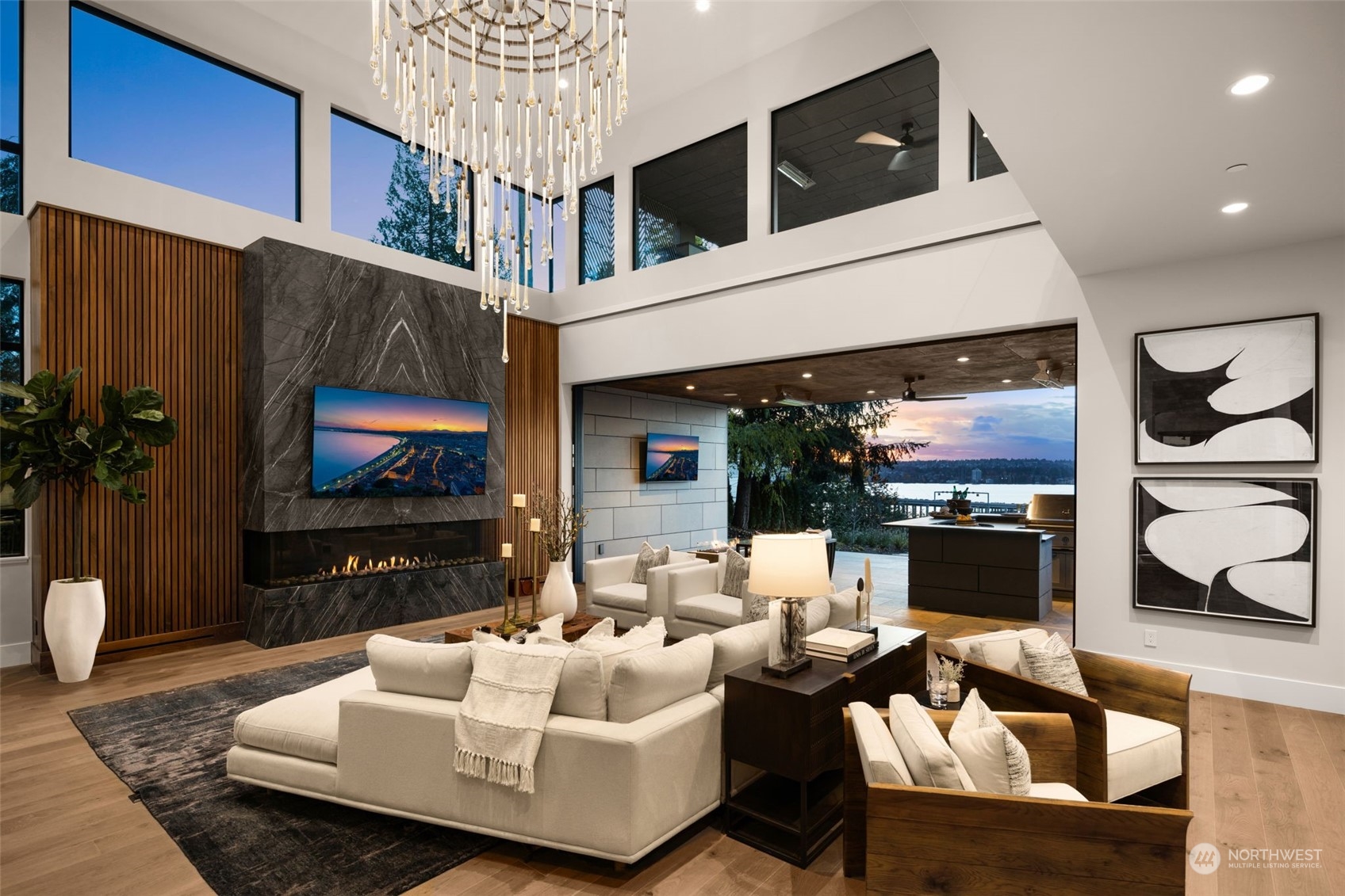 3263 Evergreen Point Road Medina, WA 98039 - Photo 23 of 37 a living room with furniture and a flat screen tv
