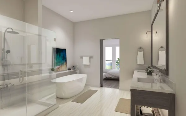 a spacious bedroom with a bed and a window