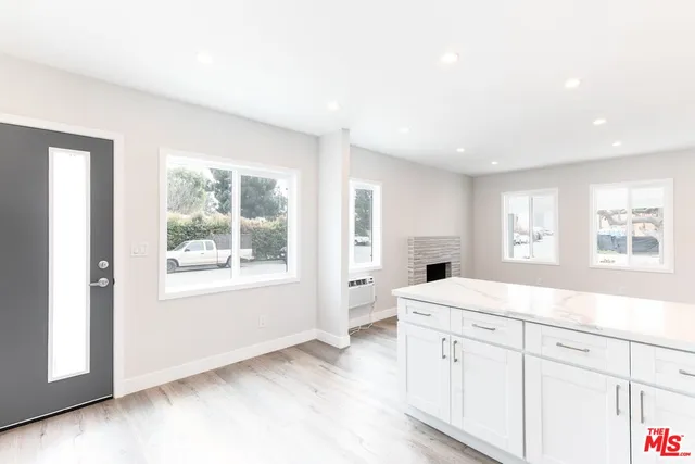 a view with windows and entrance to living room