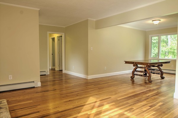 23 Hunt Road Westford, MA 01886 - Photo 11 of 27 a view of dining room with furniture and wooden floor