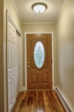 23 Hunt Road Westford, MA 01886 - Photo 15 of 27 a view of a hallway with wooden floor