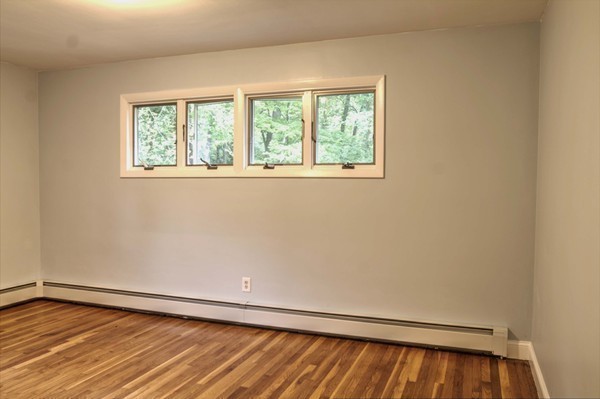 23 Hunt Road Westford, MA 01886 - Photo 19 of 27 an empty room with a window