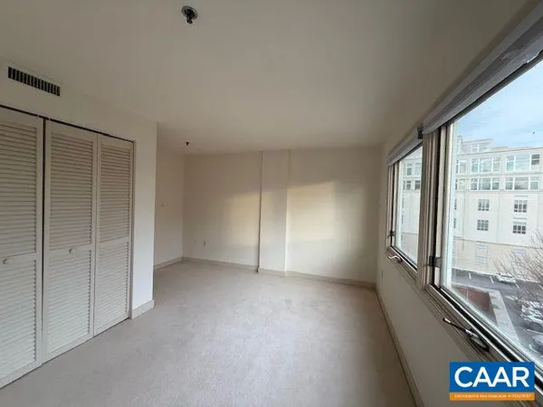 an empty room with windows