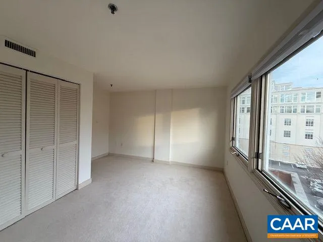 an empty room with windows