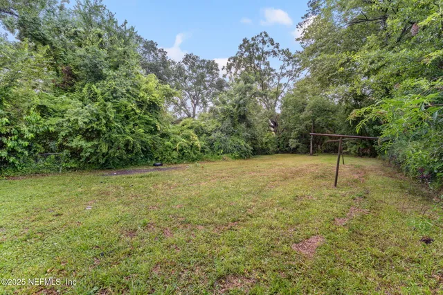 a view of outdoor space and yard