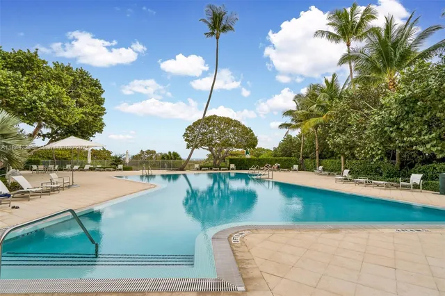 a view of a swimming pool with a lake view