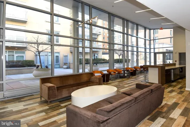 a view of a house with a tree